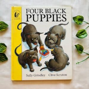 Four Black Puppies
