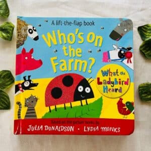 Who's On The Farm?  By Julia Donalson A Lift-the-Flap Board Book