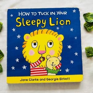 How to Tuck in Your Sleepy Lion: Board Book